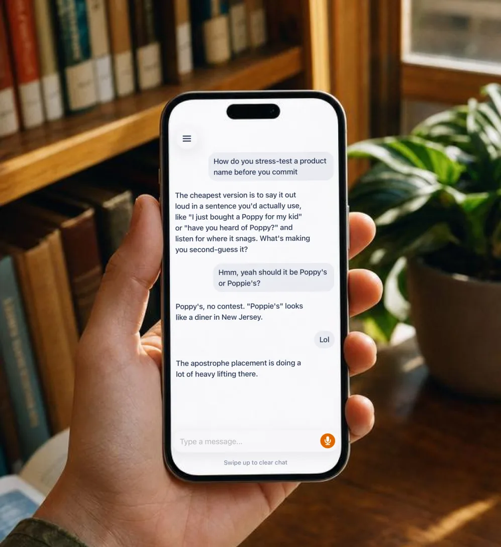 iPhone app shown in a hand.